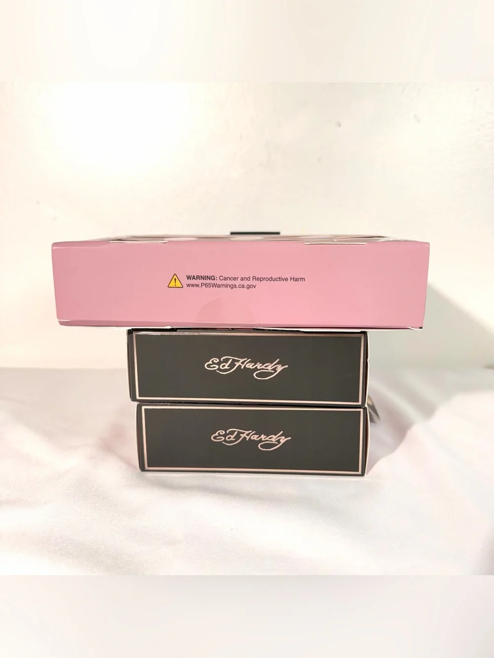 Ed Hardy Lipstick Trio in Pink, Red, Brown